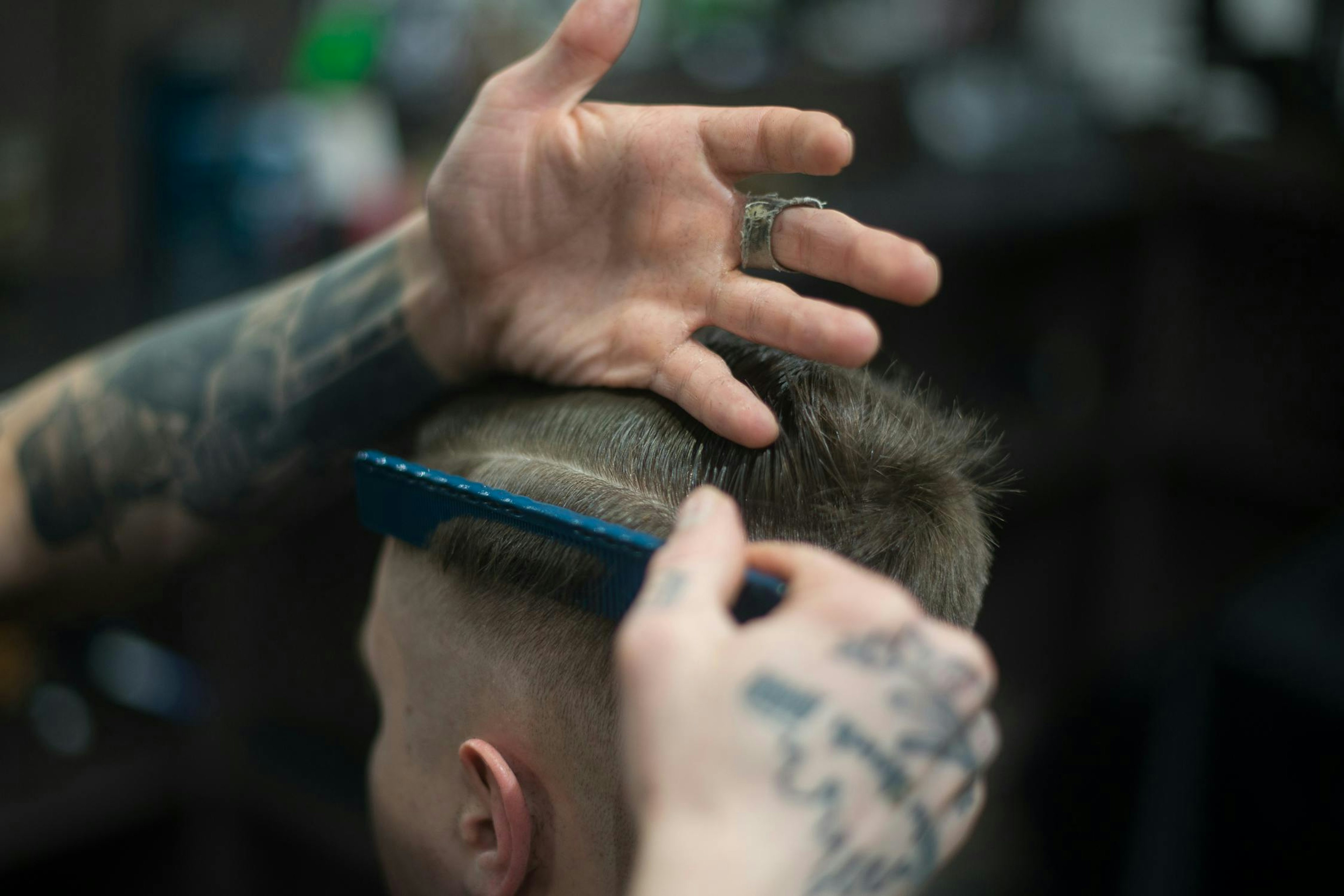 A barber cutting hair